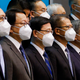 Hong Kong Chief Executive-designate John Lee attends a news conference with his newly appointed cabinet.
